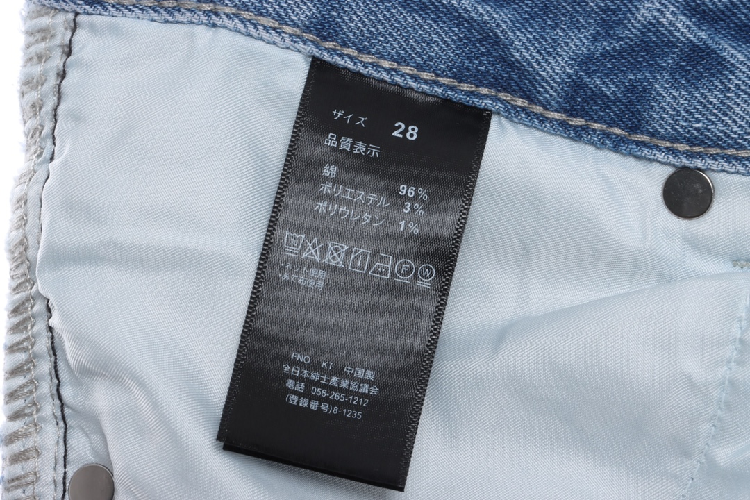 Stuart co-signed Levi’s 150th anniversary embossed denim trousers