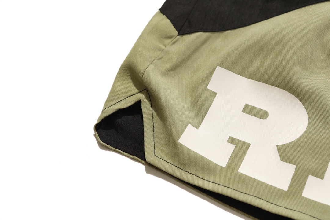 RHUDE vintage logo print two-tone drawstring shorts