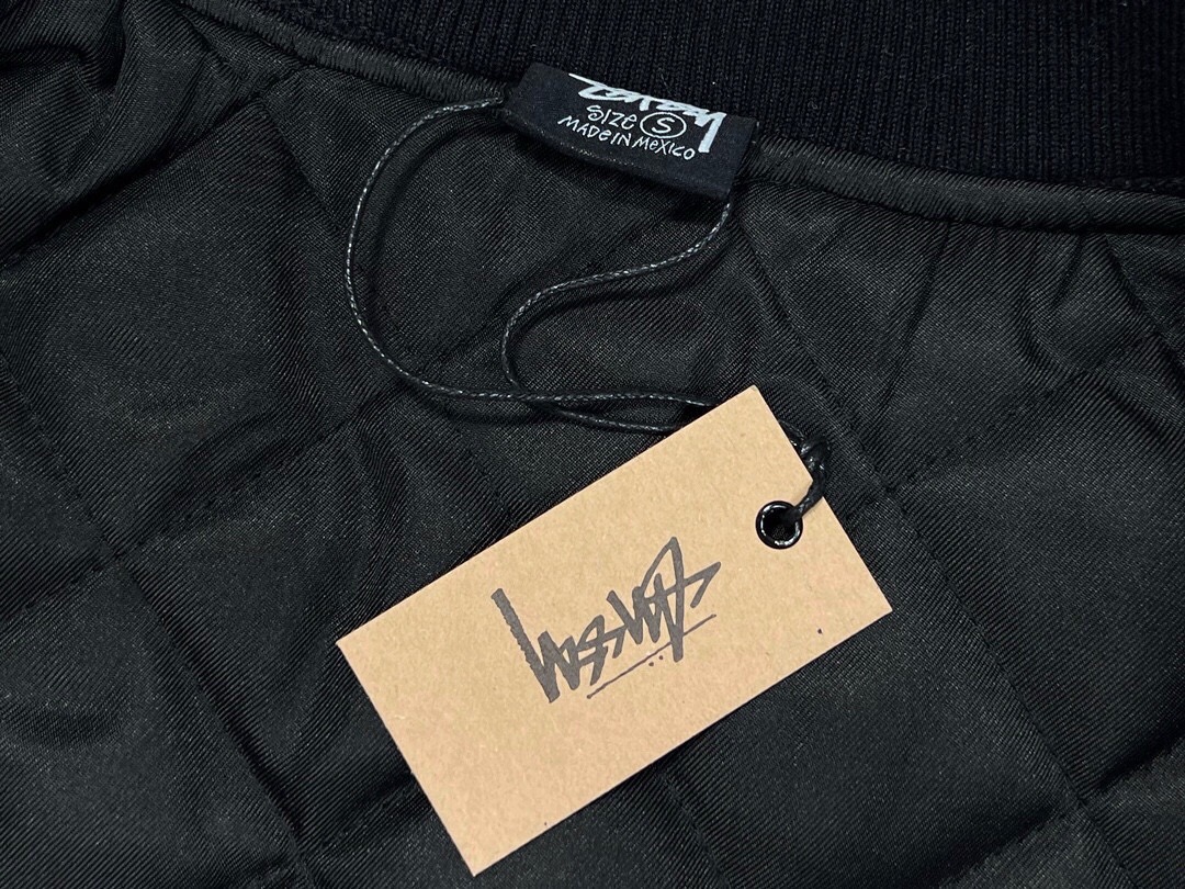 Stussy appliqué graphic print single-breasted logo stand-collar varsity jacket